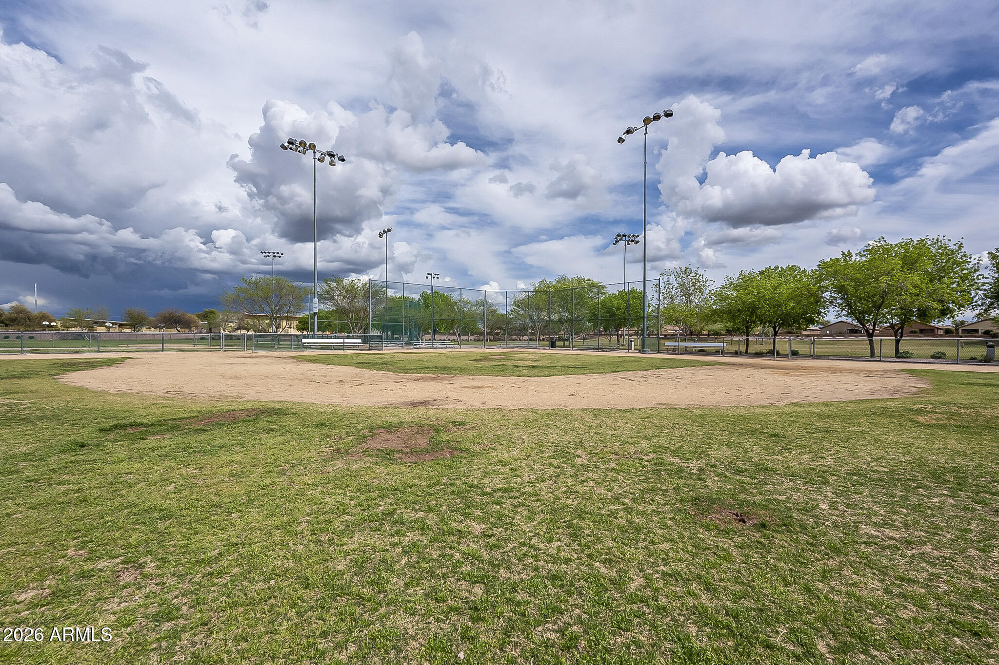 515 West Love Road San Tan Valley, AZ 85143 - Photo 45 of 74 a view of a swimming pool and an outdoor space