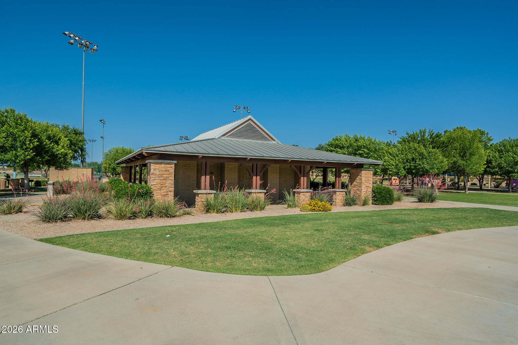 515 West Love Road San Tan Valley, AZ 85143 - Photo 66 of 74 a front view of a house with a yard