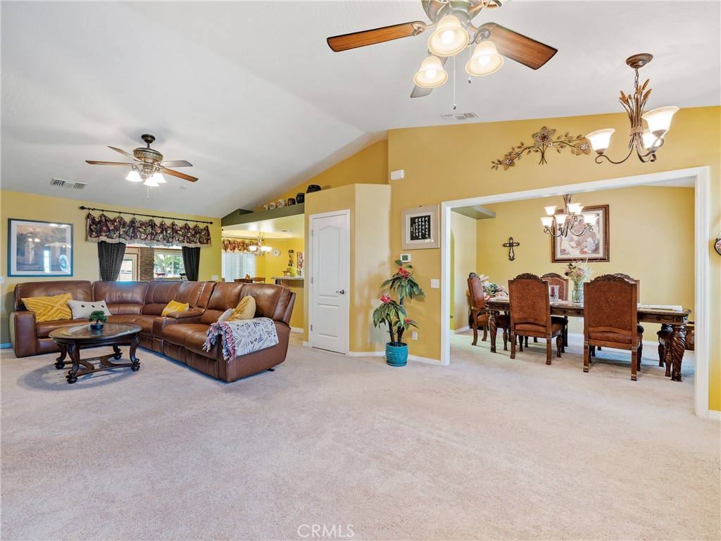 39429 Mountain View Road Yermo, CA 92398 - Photo 14 of 47 a living room with furniture and chandelier