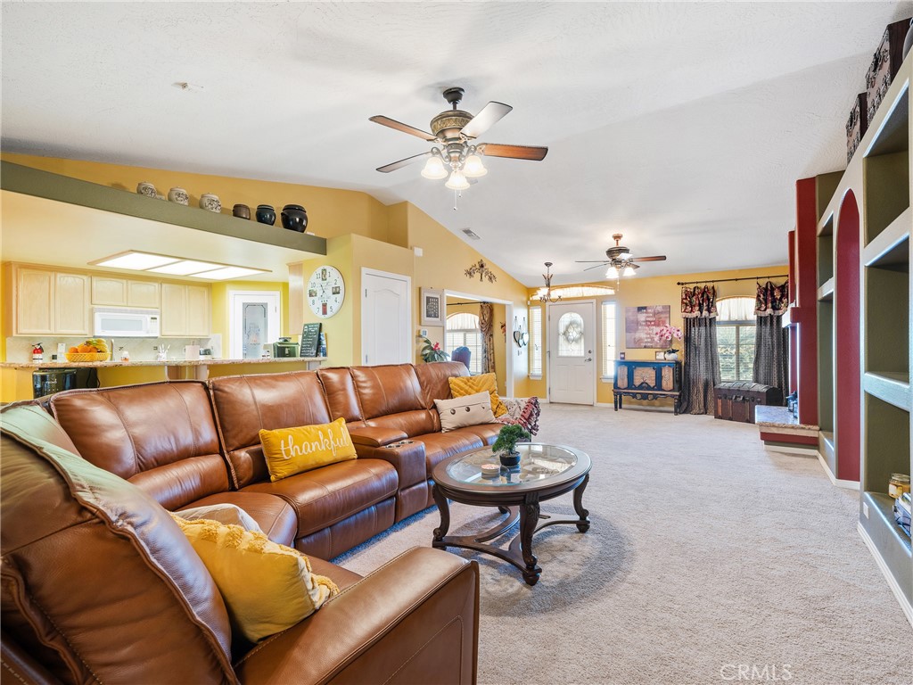 39429 Mountain View Road Yermo, CA 92398 - Photo 15 of 47 a living room with furniture and a ceiling fan