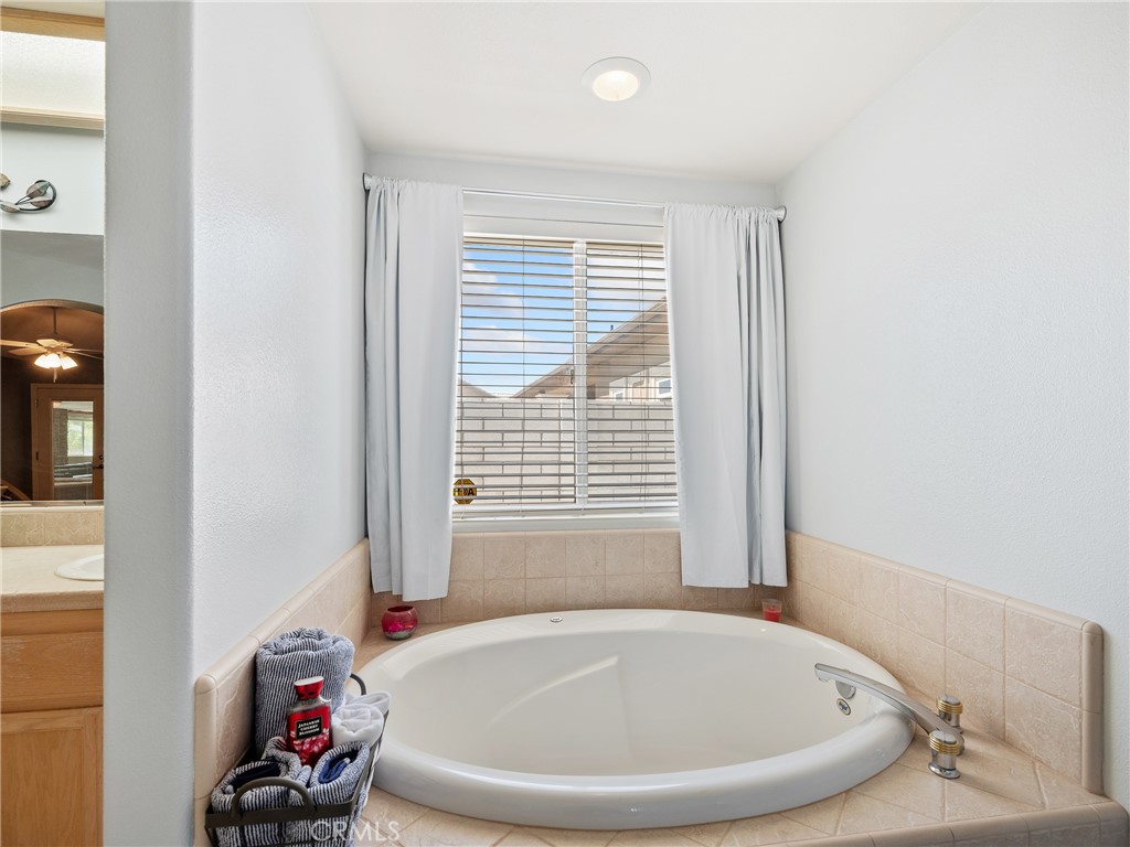 39429 Mountain View Road Yermo, CA 92398 - Photo 28 of 47 a bathroom with a tub and shower