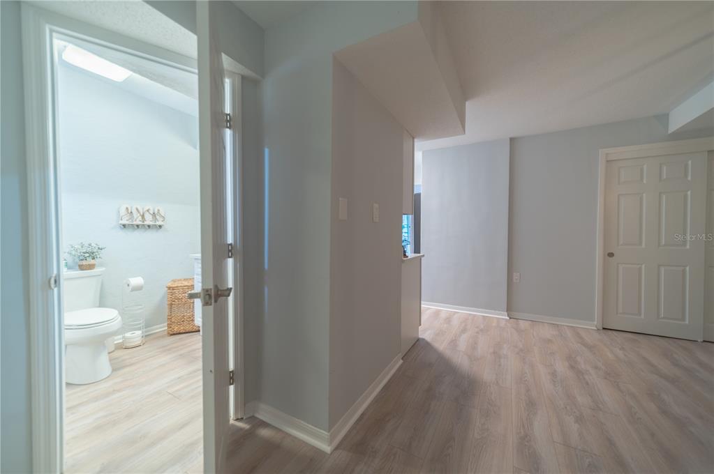 501 Pameto Road Nokomis, FL 34275 - Photo 14 of 37 a bathroom with a granite countertop toilet and a shower