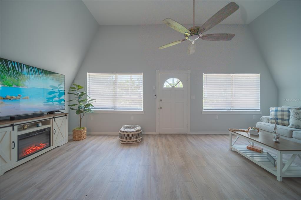501 Pameto Road Nokomis, FL 34275 - Photo 3 of 37 a view of a livingroom with furniture and a fireplace