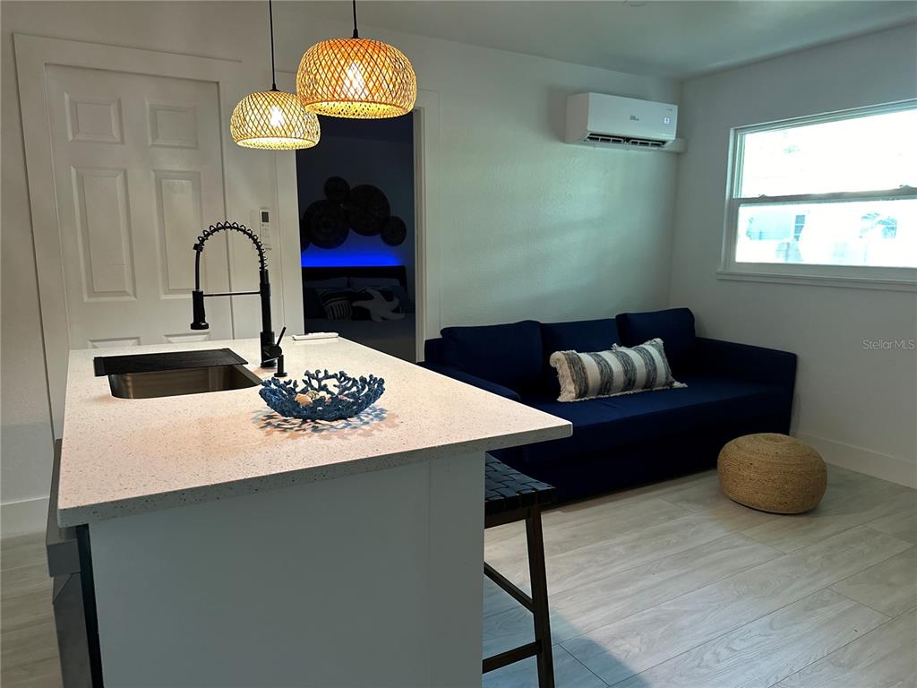 501 Pameto Road Nokomis, FL 34275 - Photo 32 of 37 a view of a dining room with furniture and chandelier