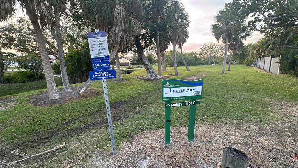 501 Pameto Road Nokomis, FL 34275 - Photo 35 of 37 a sign that is sitting on the green field
