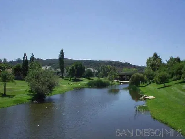 a view of a house with a garden