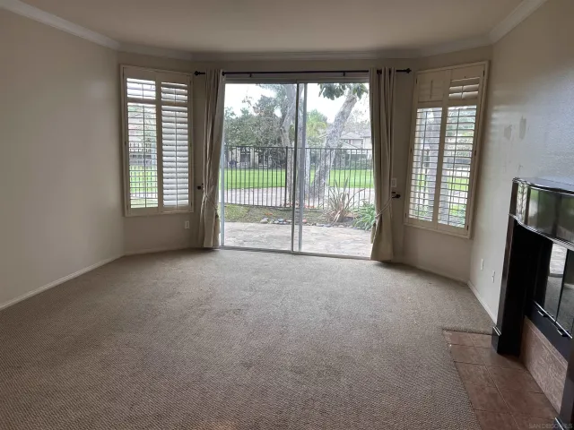 a view of empty room with front door