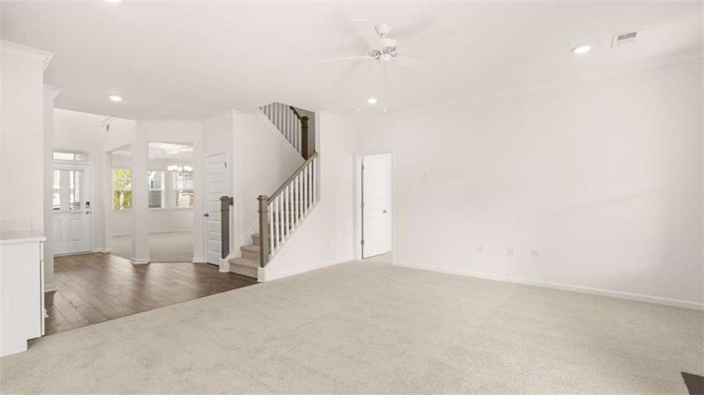 13623 Whitman Lane Covington, GA 30014 - Photo 14 of 45 a view of entryway and hall with wooden floor