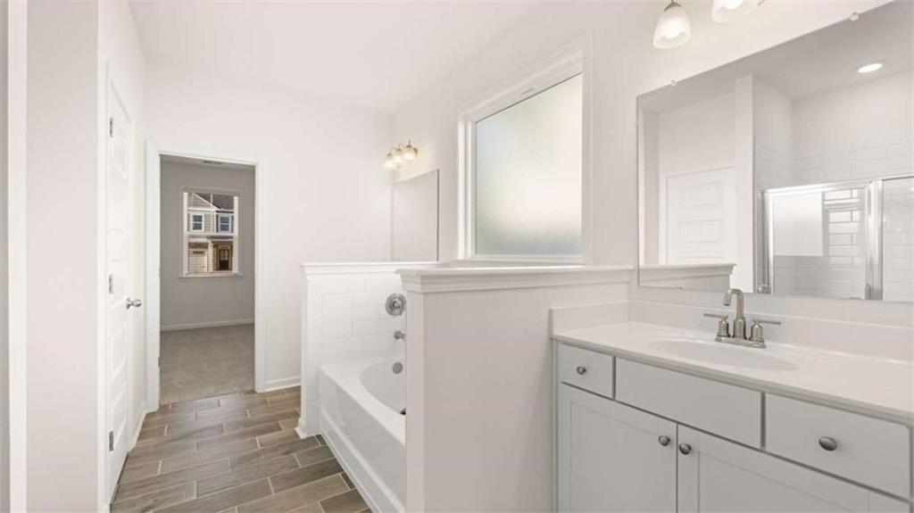 13623 Whitman Lane Covington, GA 30014 - Photo 20 of 45 a bathroom with a sink and a mirror