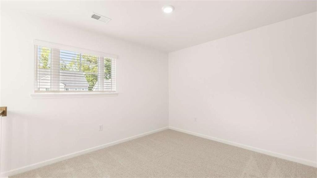 13623 Whitman Lane Covington, GA 30014 - Photo 29 of 45 an empty room with a window
