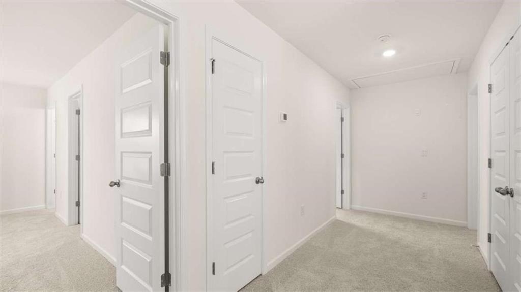 13623 Whitman Lane Covington, GA 30014 - Photo 31 of 45 a view of a hallway with closet area