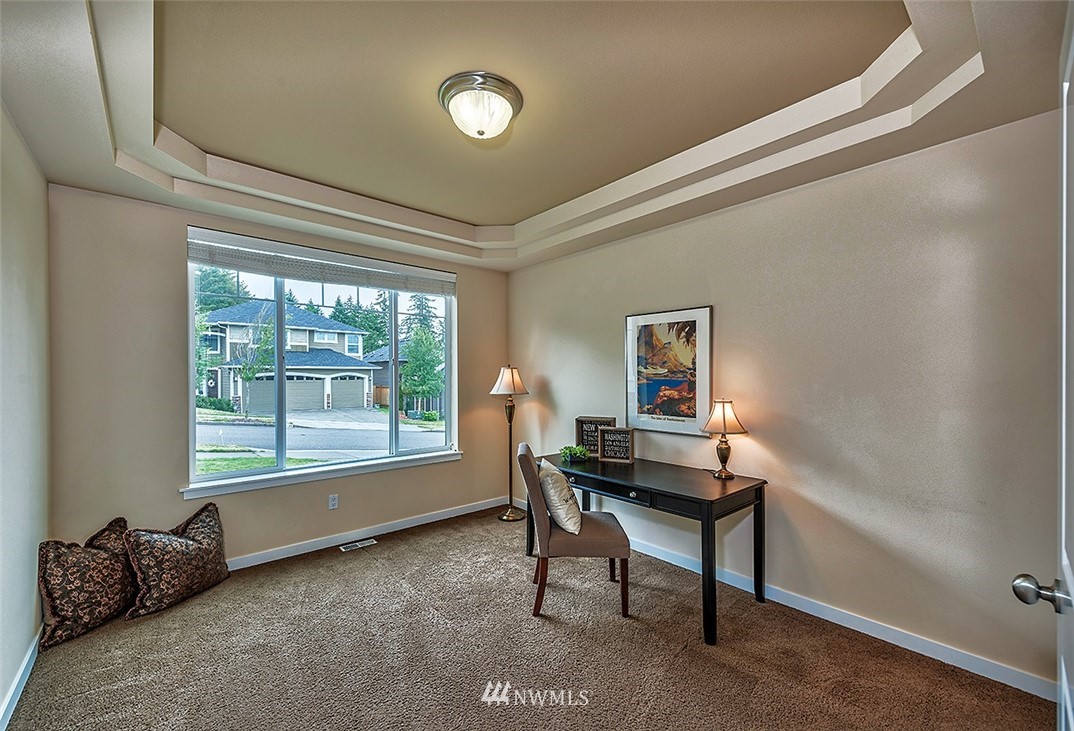 4201 222nd Place Southeast Bothell, WA 98021 - Photo 11 of 25 a room with furniture and a window