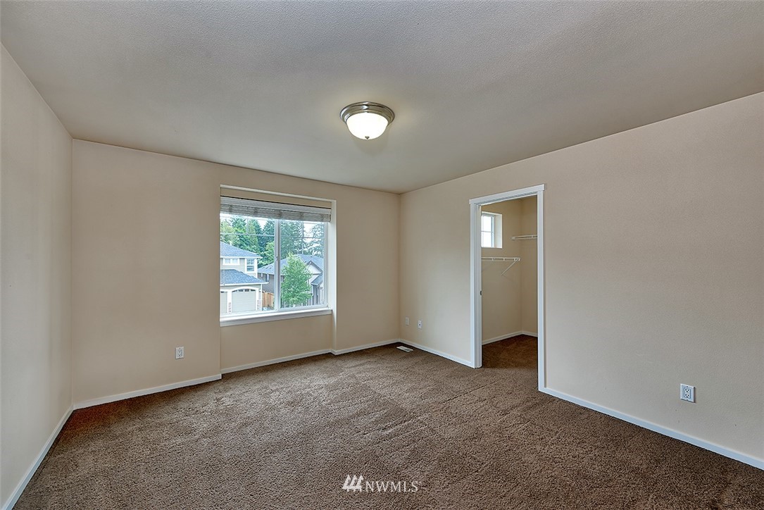 4201 222nd Place Southeast Bothell, WA 98021 - Photo 21 of 25 an empty room with a window