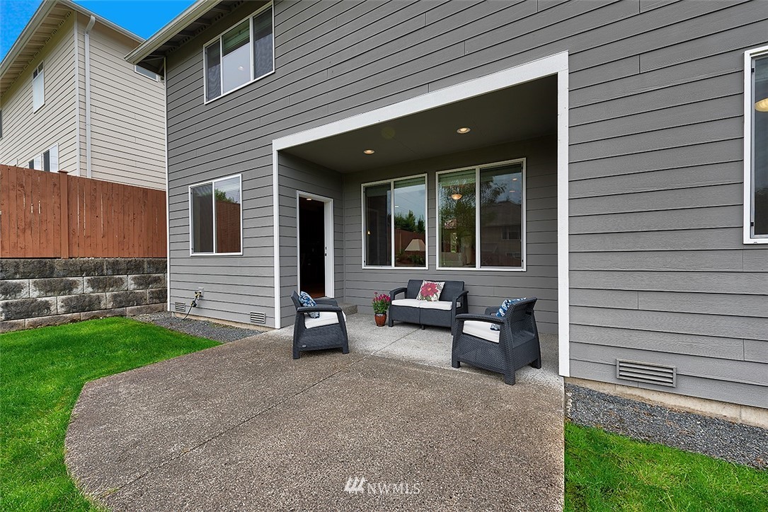 4201 222nd Place Southeast Bothell, WA 98021 - Photo 22 of 25 a view of a house with backyard and sitting area