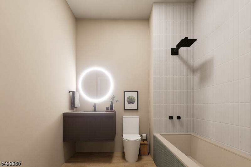 74 Webster Street Newark, NJ 07104 - Photo 22 of 22 a bathroom with a toilet sink and bathtub