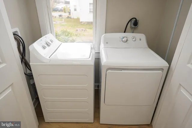 a utility room with dryer and washer