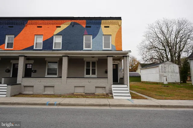 a view of a house with a swimming pool