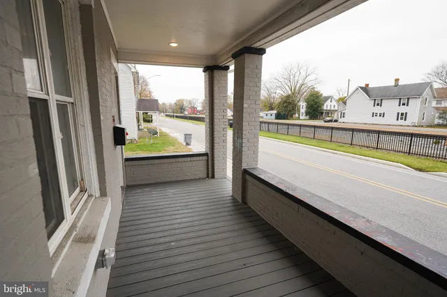 a view of a balcony with an outdoor space