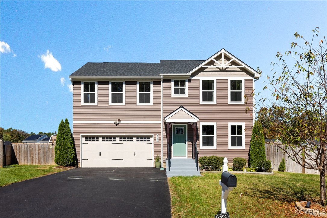 8012 Oxer Road North Chesterfield, VA 23235 - Photo 1 of 1 View of front of property featuring a garage and a