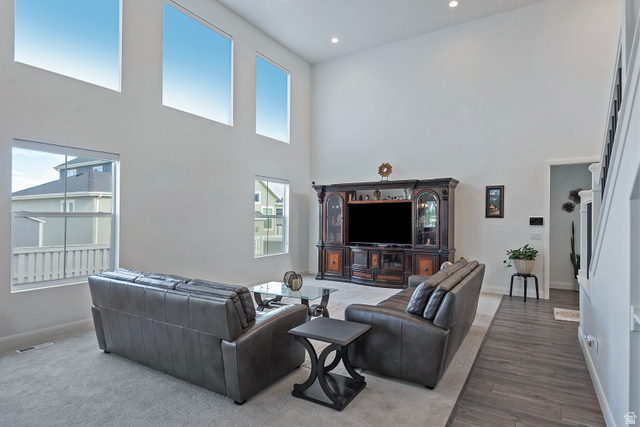 11694 Engelmann Drive Draper, UT 84020 - Photo 11 of 41 Living room featuring a high ceiling and recessed lighting