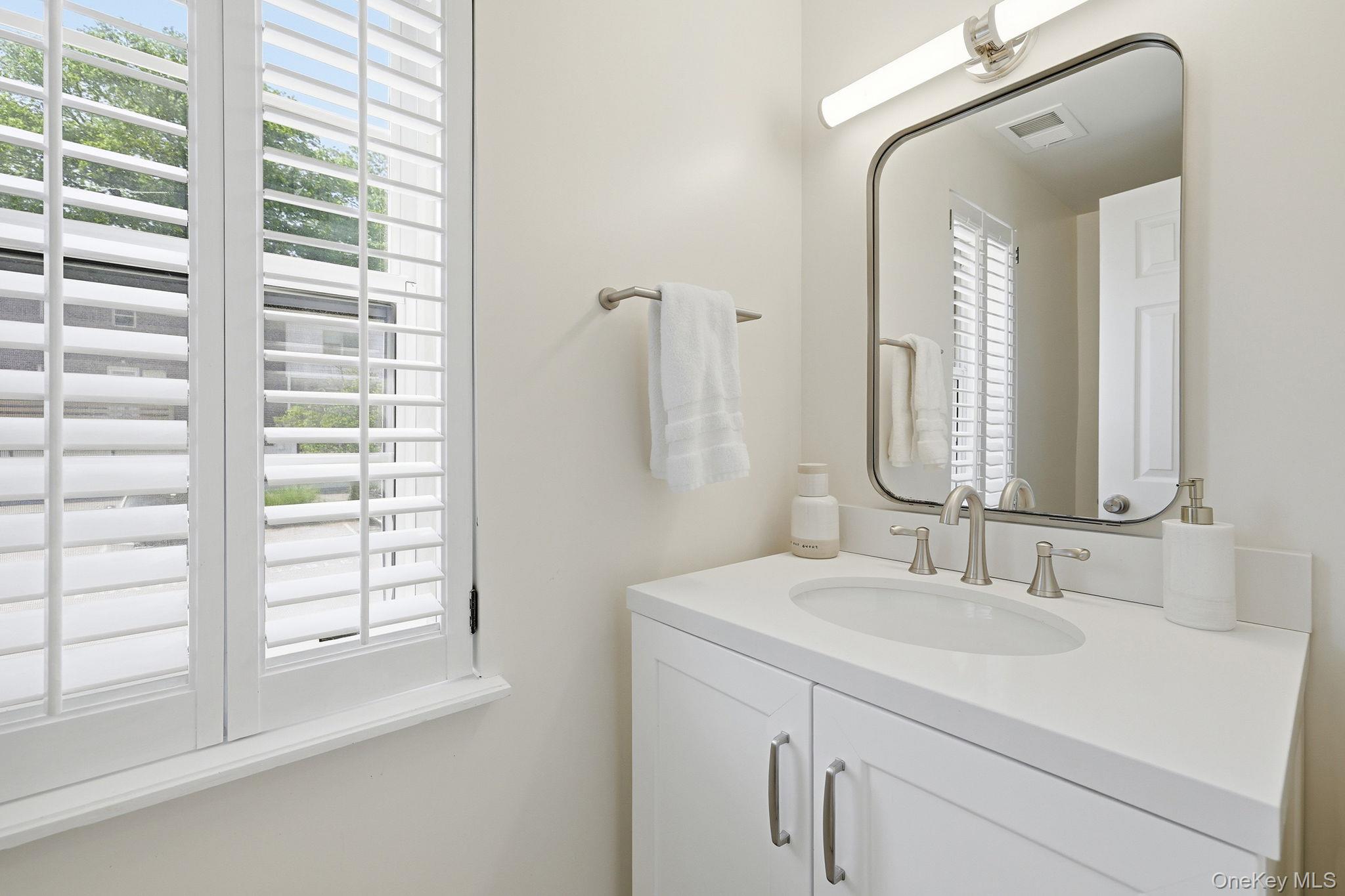 599 Midland Avenue, Unit 35 Rye, NY 10580 - Photo 9 of 20 Powder room on same floor as living / kitchen / dining
