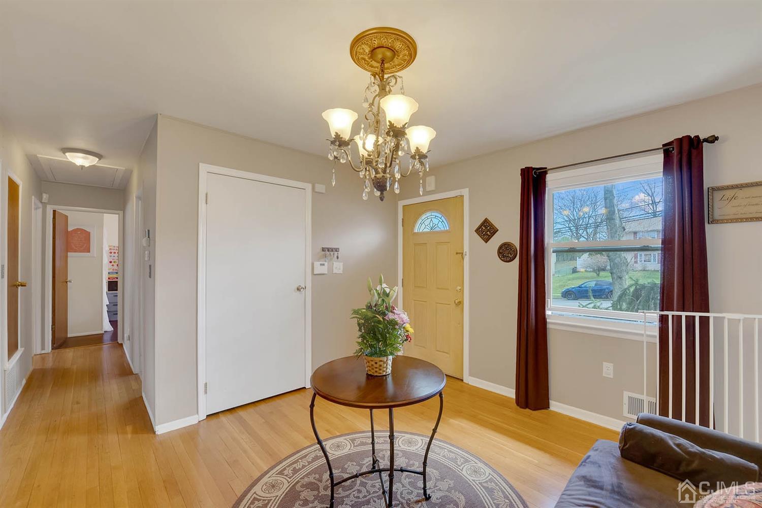 21 Villanova Road Old Bridge, NJ 08859 - Photo 5 of 15 a view of a dining room with furniture and a chandelier