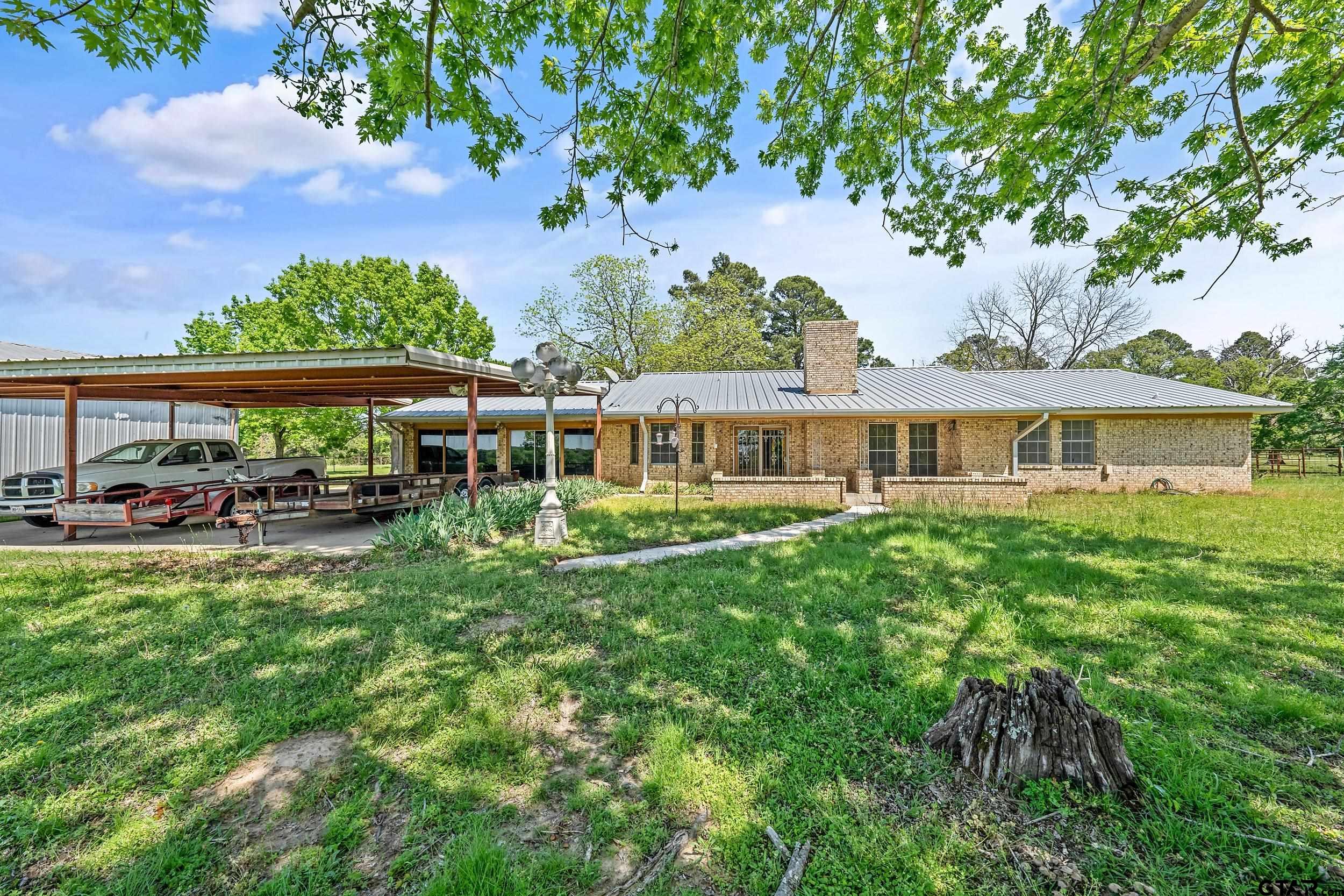 1382 VZ County Road Canton, TX 75103 - Photo 14 of 40 a view of a house with garden and a sitting area