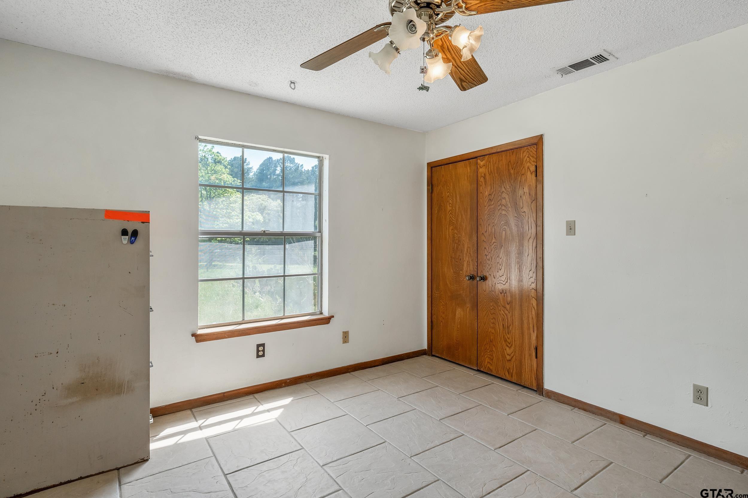1382 VZ County Road Canton, TX 75103 - Photo 27 of 40 a view of an empty room with a window