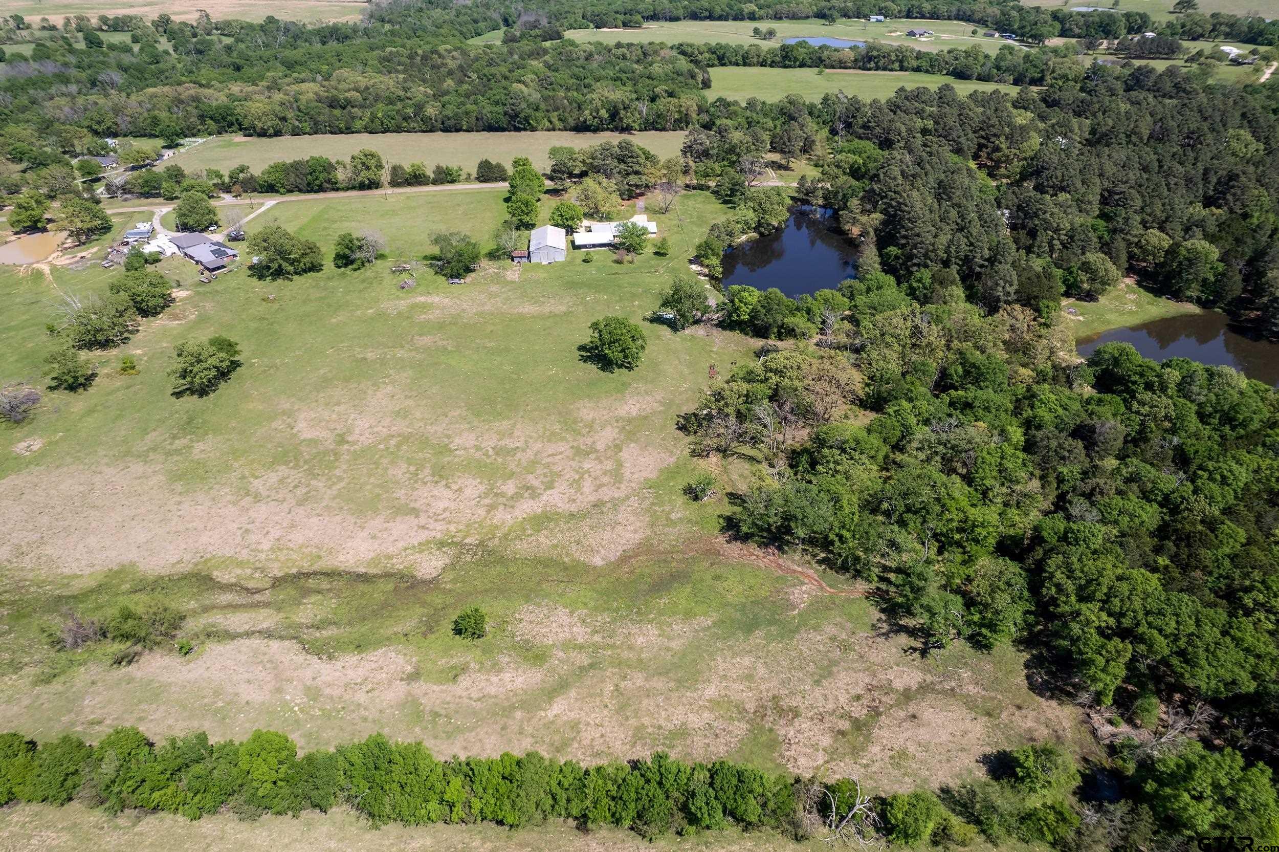 1382 VZ County Road Canton, TX 75103 - Photo 36 of 40 an aerial view of residential houses with outdoor space and trees