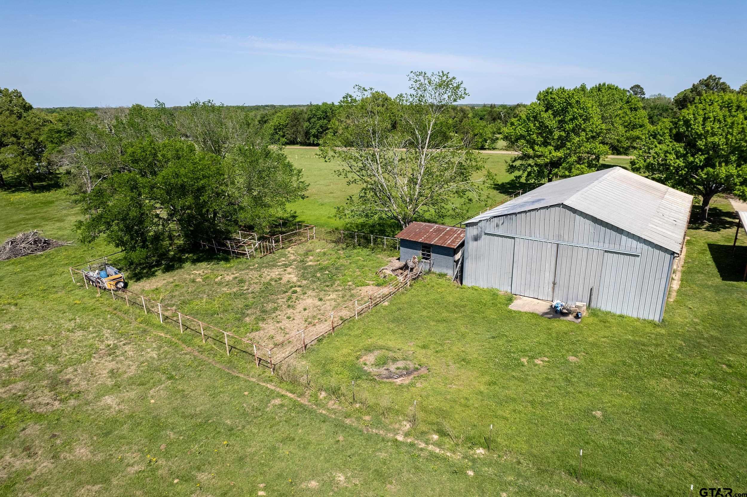 1382 VZ County Road Canton, TX 75103 - Photo 10 of 40 a backyard of a house with lots of green space