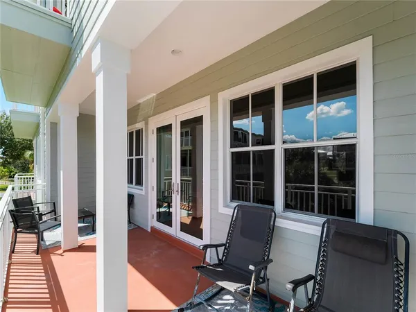 an aerial view of a house with a garden