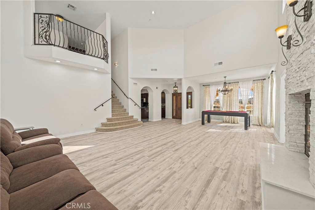13560 Sego Road Agua Dulce, CA 91390 - Photo 12 of 75 a view of livingroom with furniture and stairs