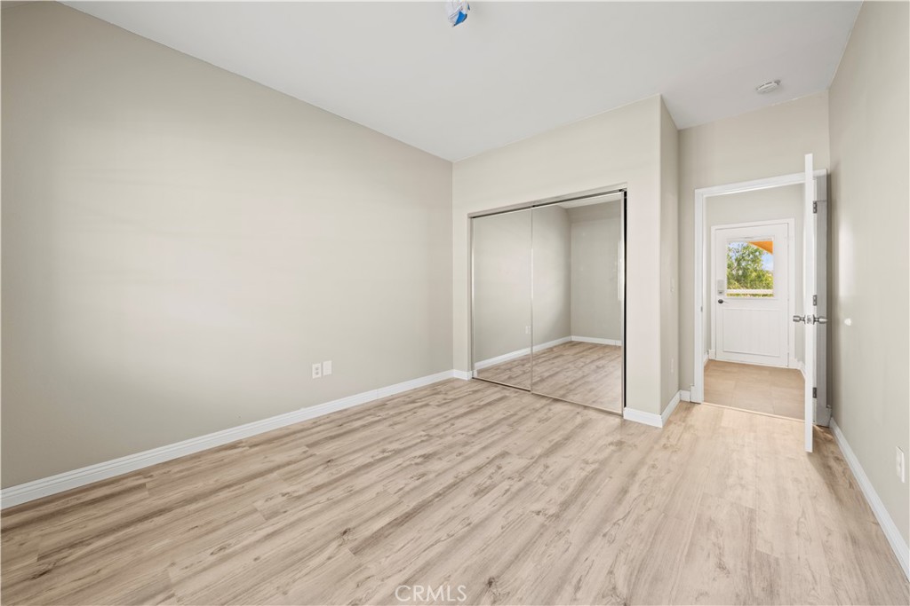 13560 Sego Road Agua Dulce, CA 91390 - Photo 46 of 75 a view of an empty room and wooden floor