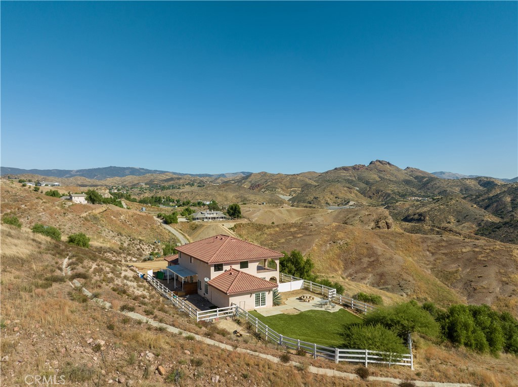 13560 Sego Road Agua Dulce, CA 91390 - Photo 5 of 75 an aerial view of residential houses with outdoor space