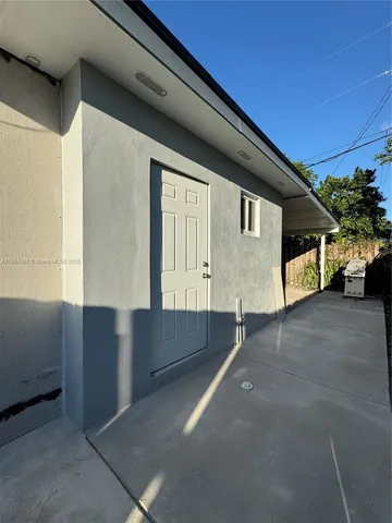 a view of outdoor space with wooden fence