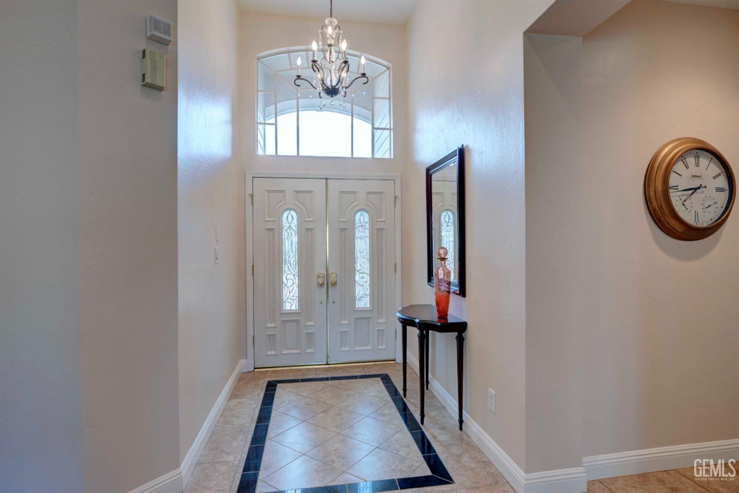 Undisclosed Address Bakersfield, CA 93312 - Photo 3 of 33 a view of a hallway with entryway