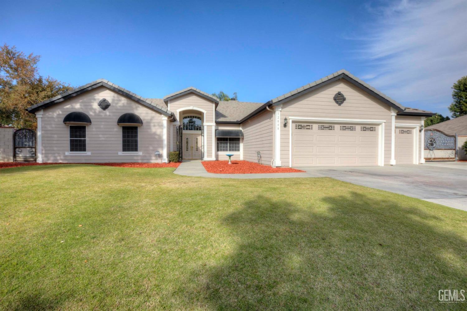 Undisclosed Address Bakersfield, CA 93312 - Photo 33 of 33 a front view of house with yard and green space