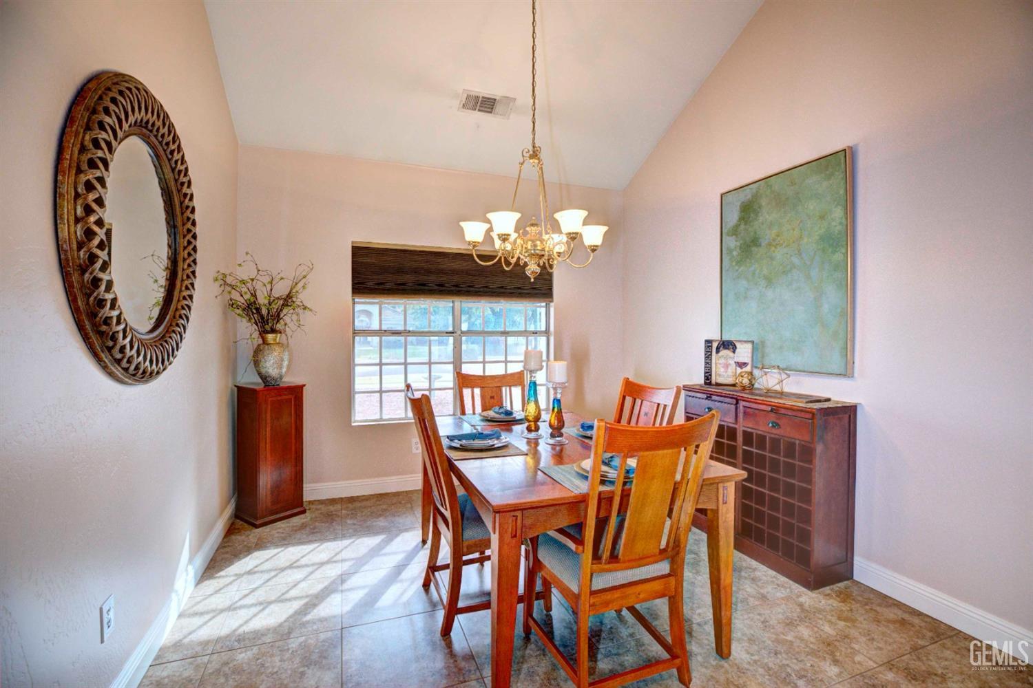 Undisclosed Address Bakersfield, CA 93312 - Photo 5 of 33 a dining room with furniture and window