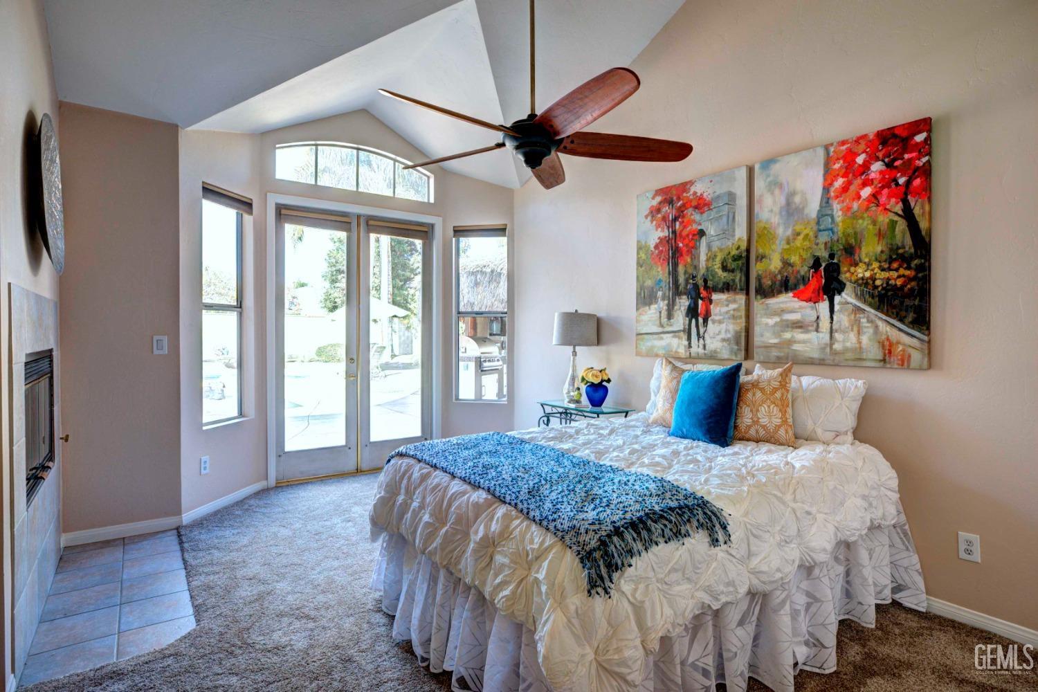 Undisclosed Address Bakersfield, CA 93312 - Photo 10 of 33 a bedroom with a bed dresser and a large window