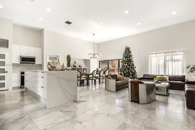 a living room with lots of furniture and appliances