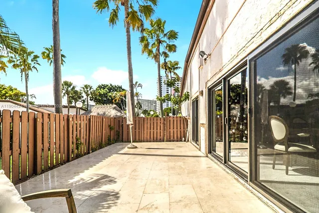 a view of a porch with a tree