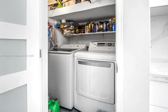 a utility room with dryer and washer