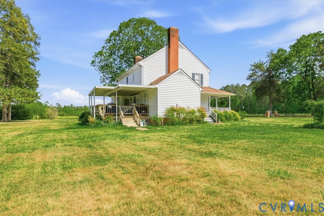 15414 Sunnybrook Road Petersburg, VA 23805 - Photo 3 of 29 a view of a house with backyard and a tree