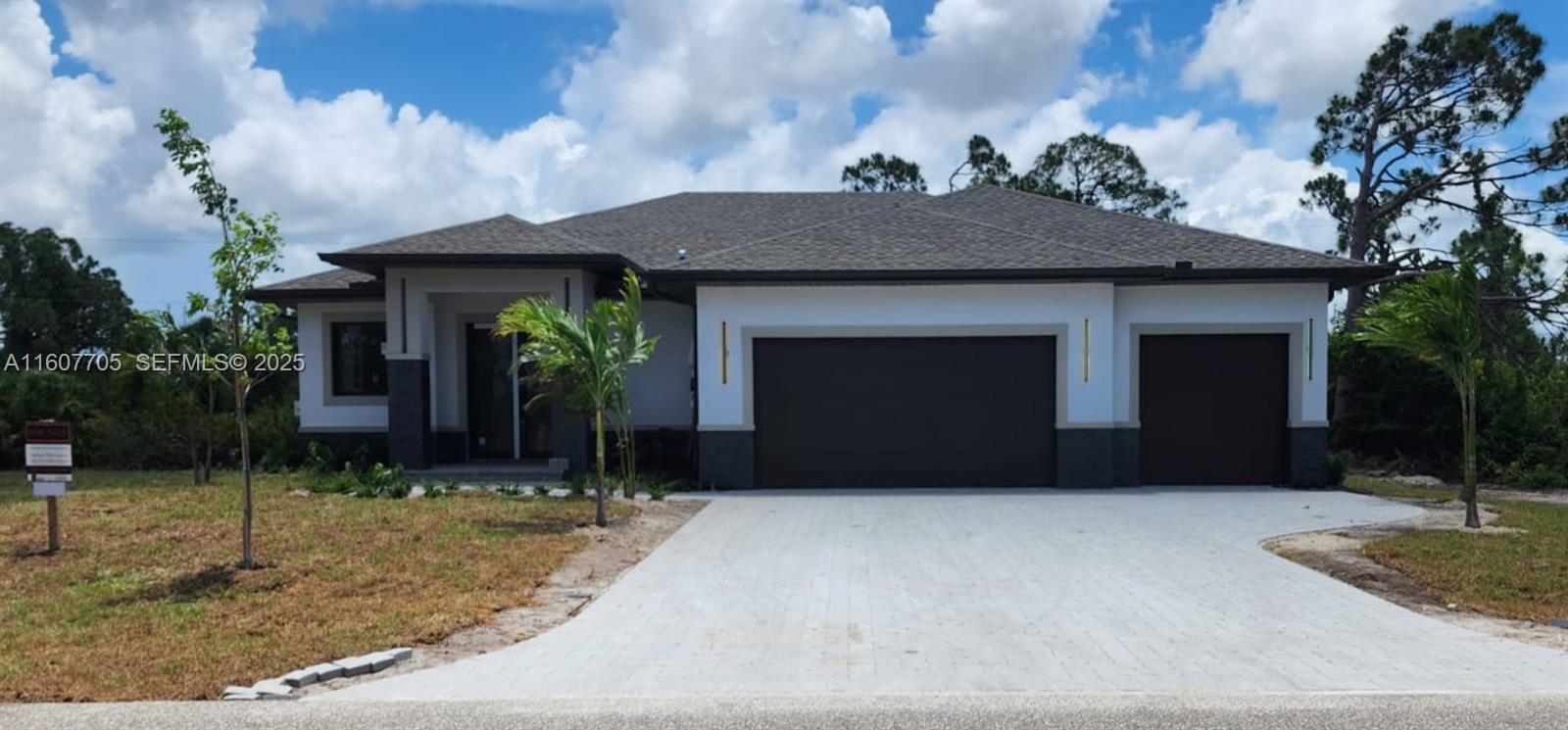 a house view with a garden space