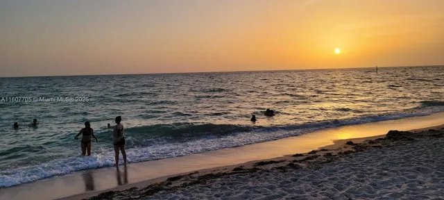 a view of a room with lots of green space and mountain view