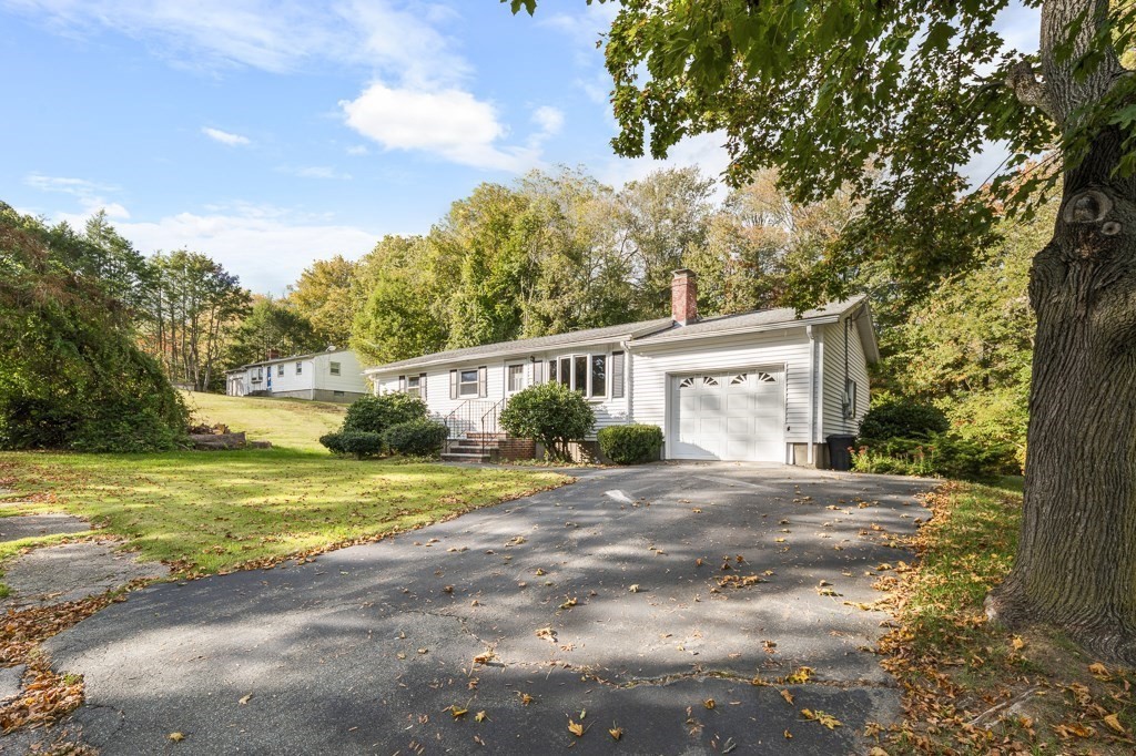 53 Cochato Park Randolph, MA 02368 - Photo 2 of 20 a view of a house with a yard and large trees