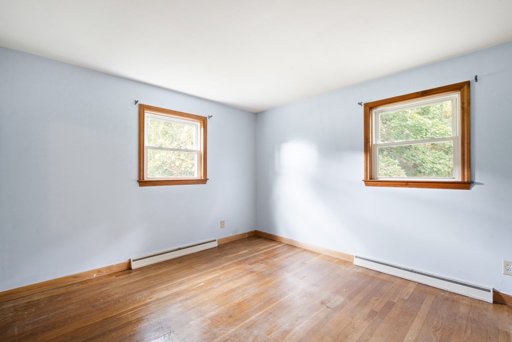 53 Cochato Park Randolph, MA 02368 - Photo 10 of 20 a view of empty room with wooden floor and fan