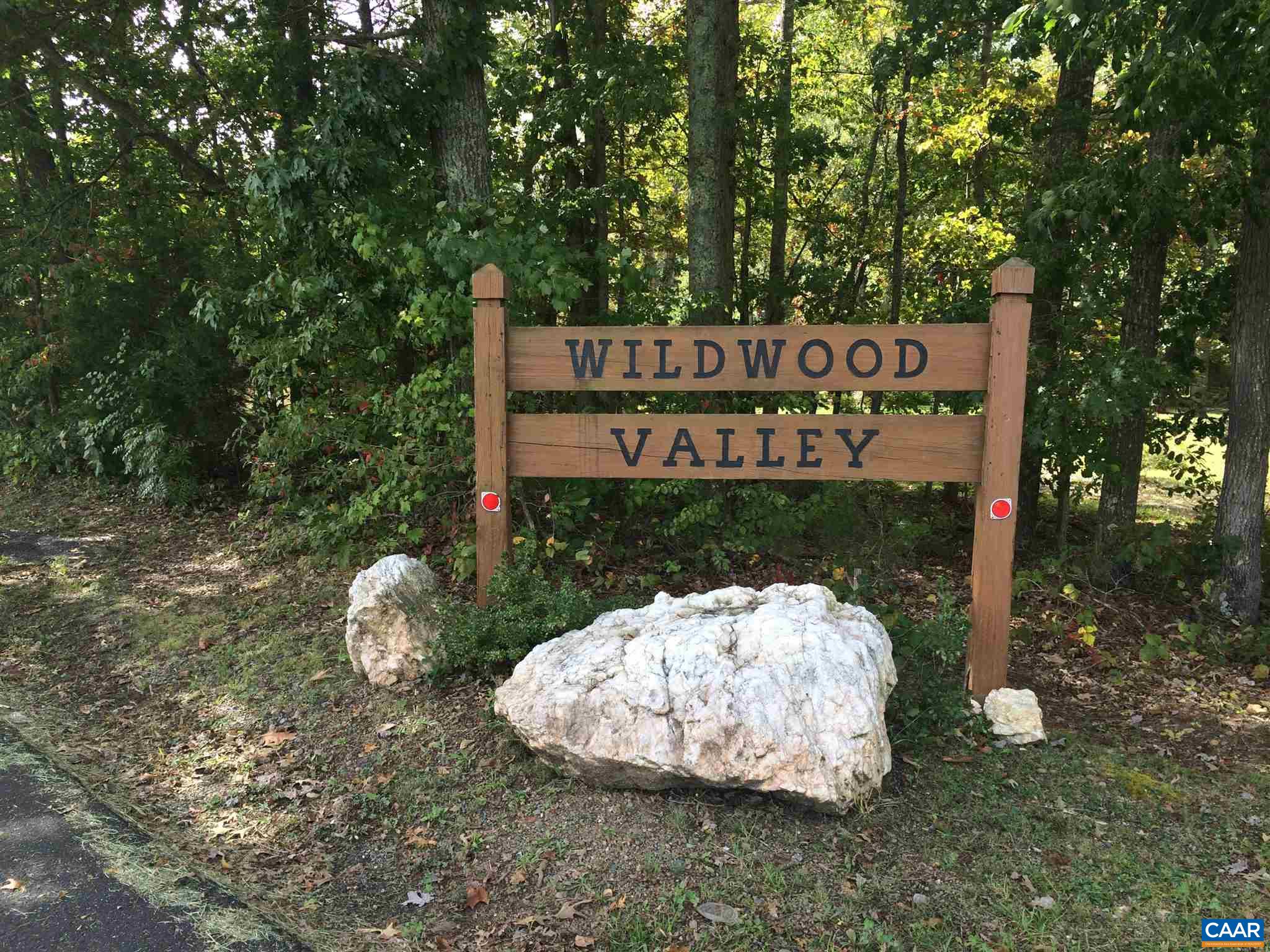 116 Crest Road Ruckersville, VA 22968 - Photo 1 of 4 a sign that is sitting in the middle of a yard
