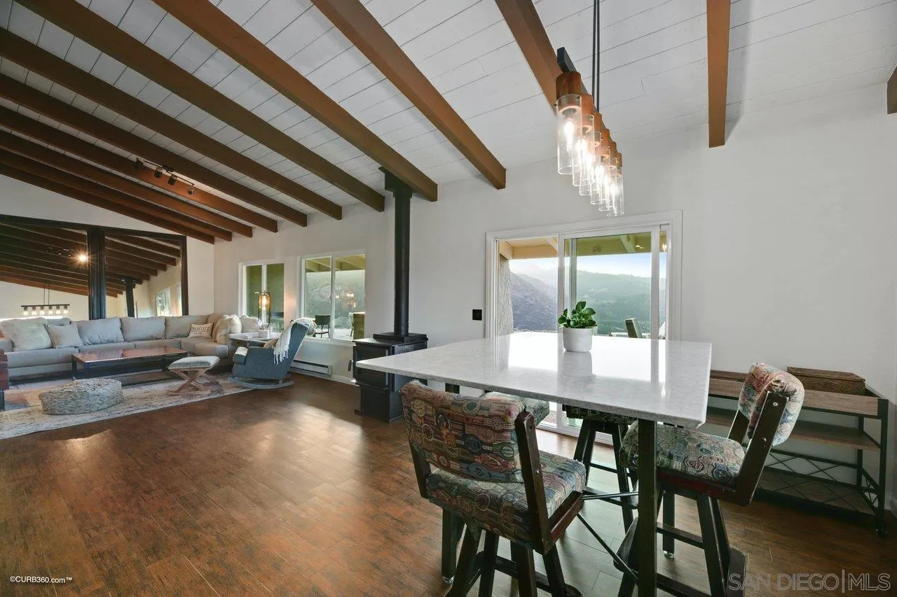 2925 Cordrey Drive Escondido, CA 92029 - Photo 23 of 75 a dining room with furniture and wooden floor