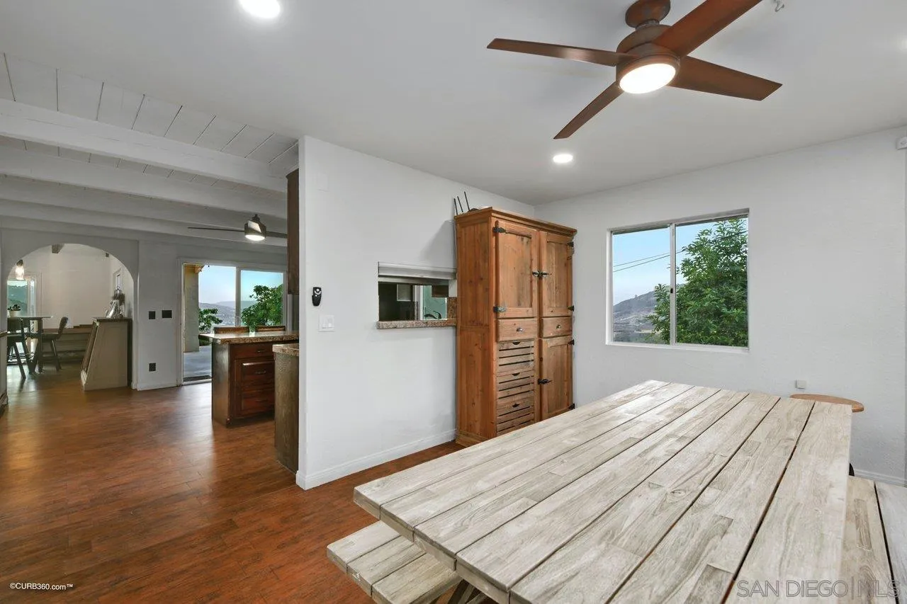 2925 Cordrey Drive Escondido, CA 92029 - Photo 29 of 75 a bed room with a bed closet and a large window